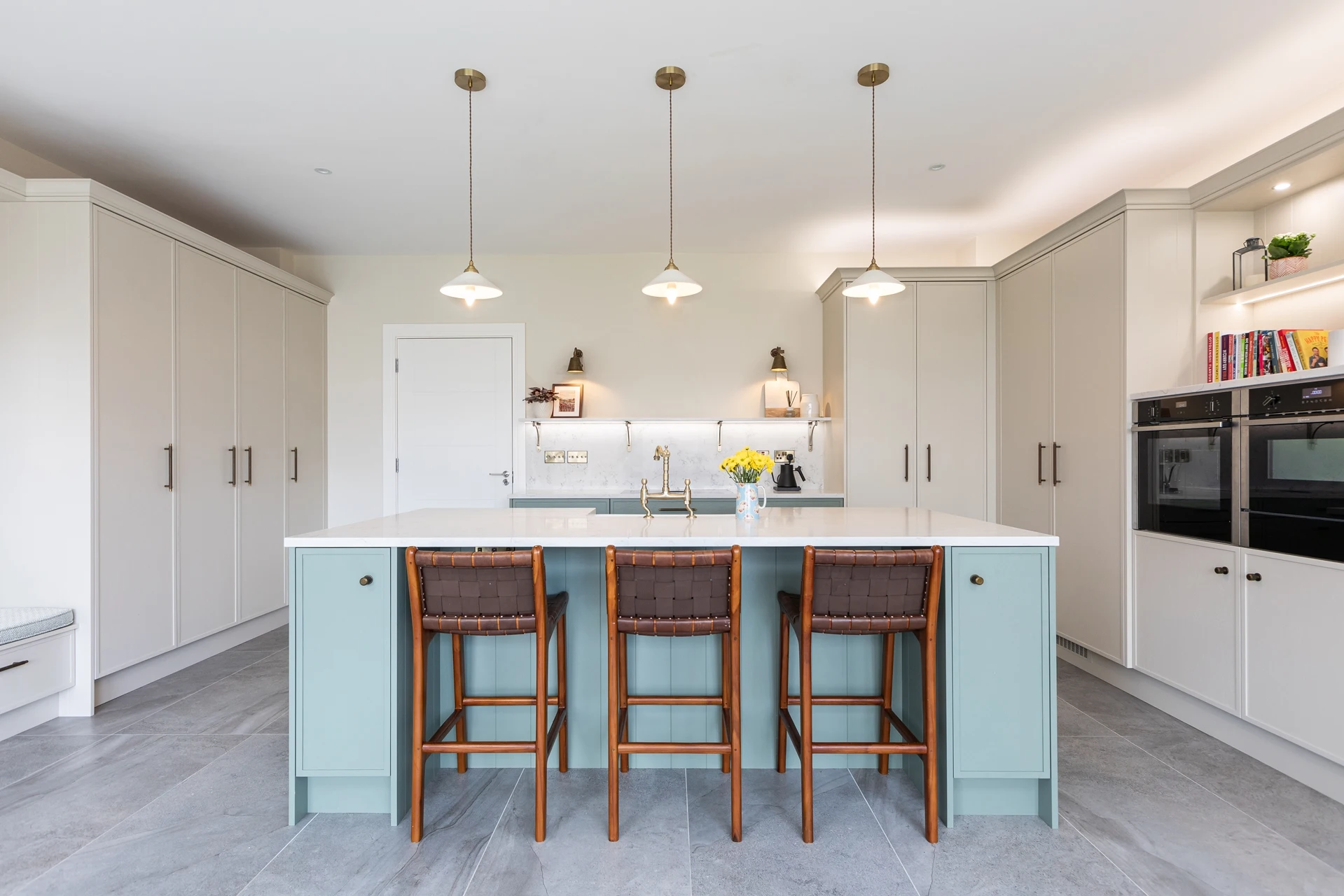 Bespoke Kitchen with Island Seating with Farrow & Ball shaded white cabinets Doran Kitchens