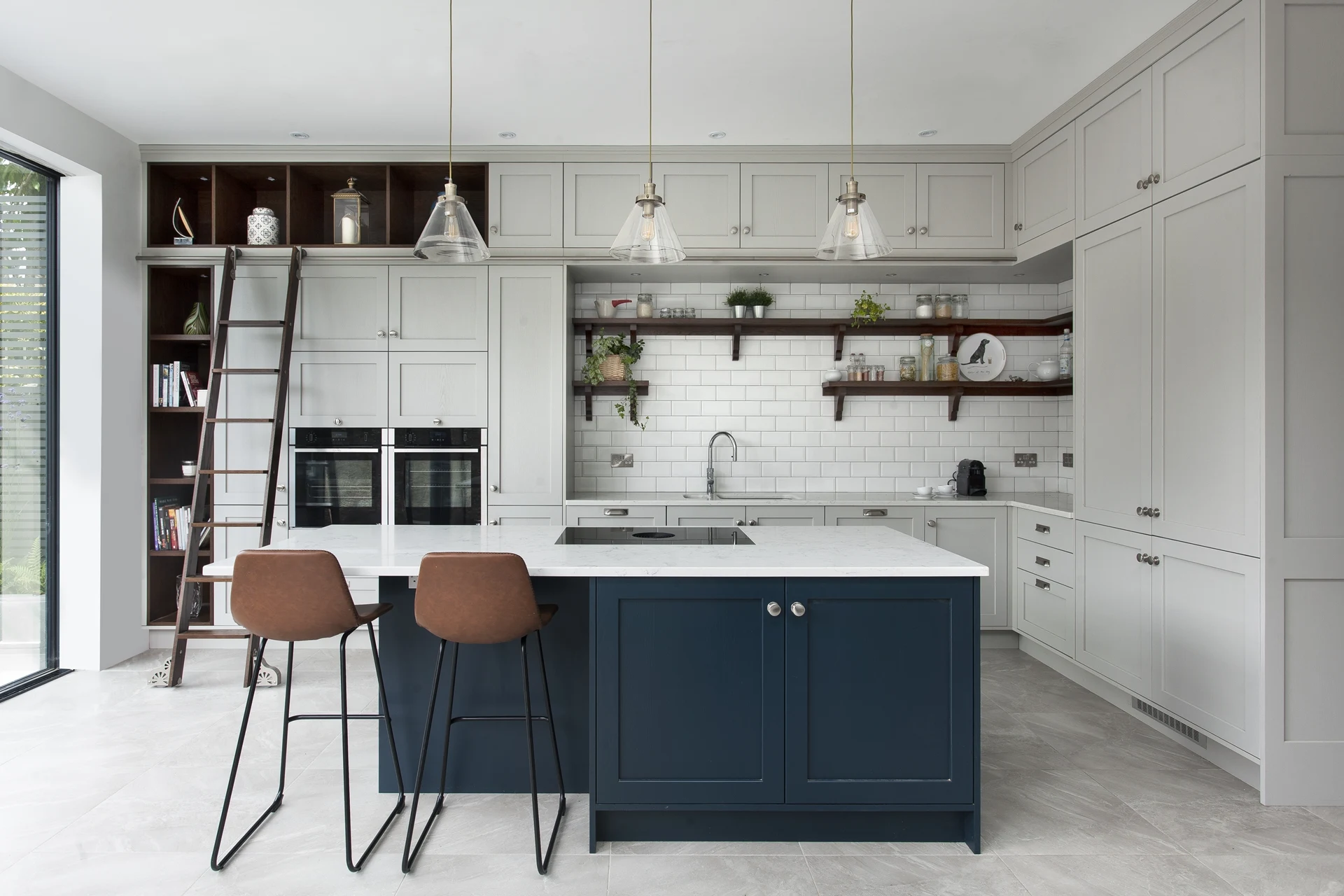 Classic Kitchen with Library Ladder and Farrow & Ball Pavilion Gray Cabinets Doran Kitchens