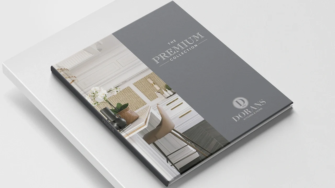 Doran Kitchens Premium Brochure on Light Grey Table Top